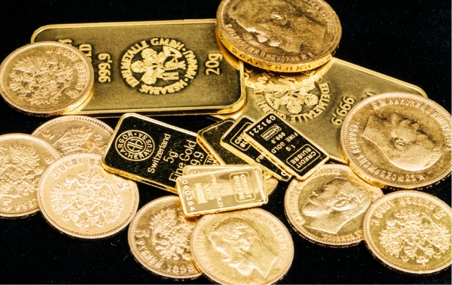 Bullion bars and coins representing investment in precious metals