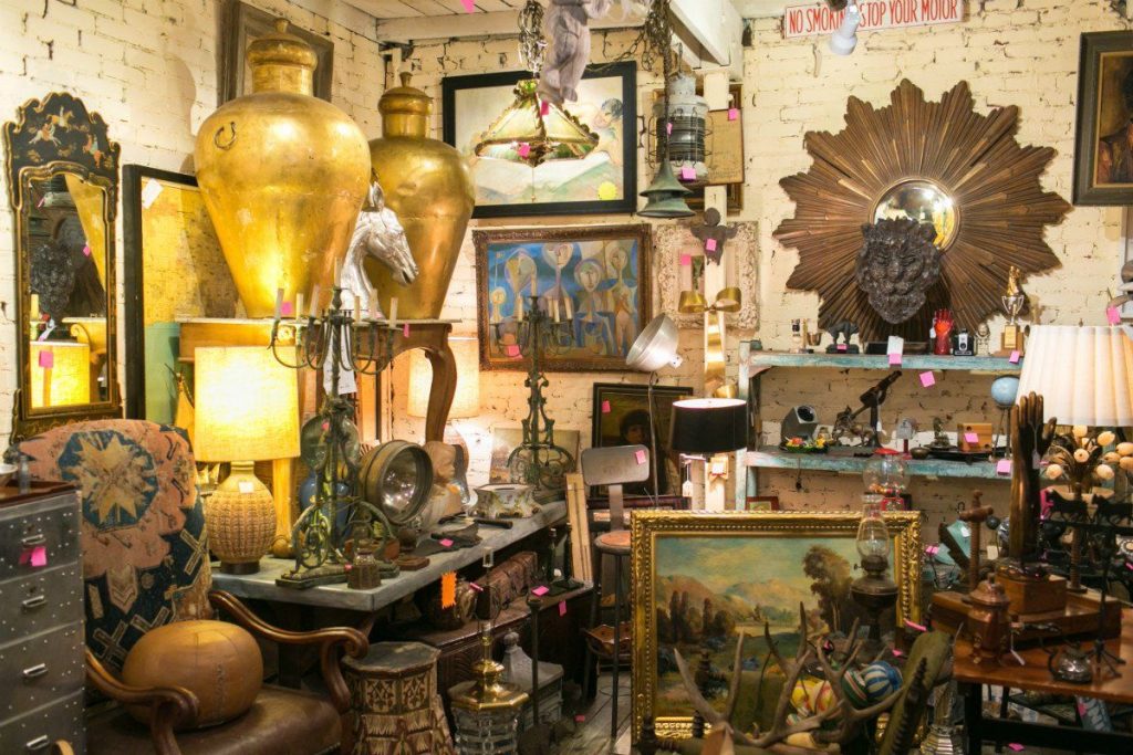Antique items displayed in a pawnshop interior