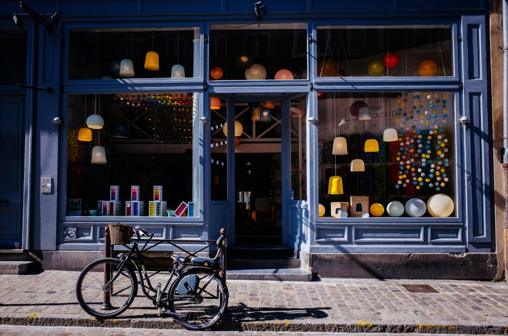 Historic pawn shop storefront with customer and staff interaction