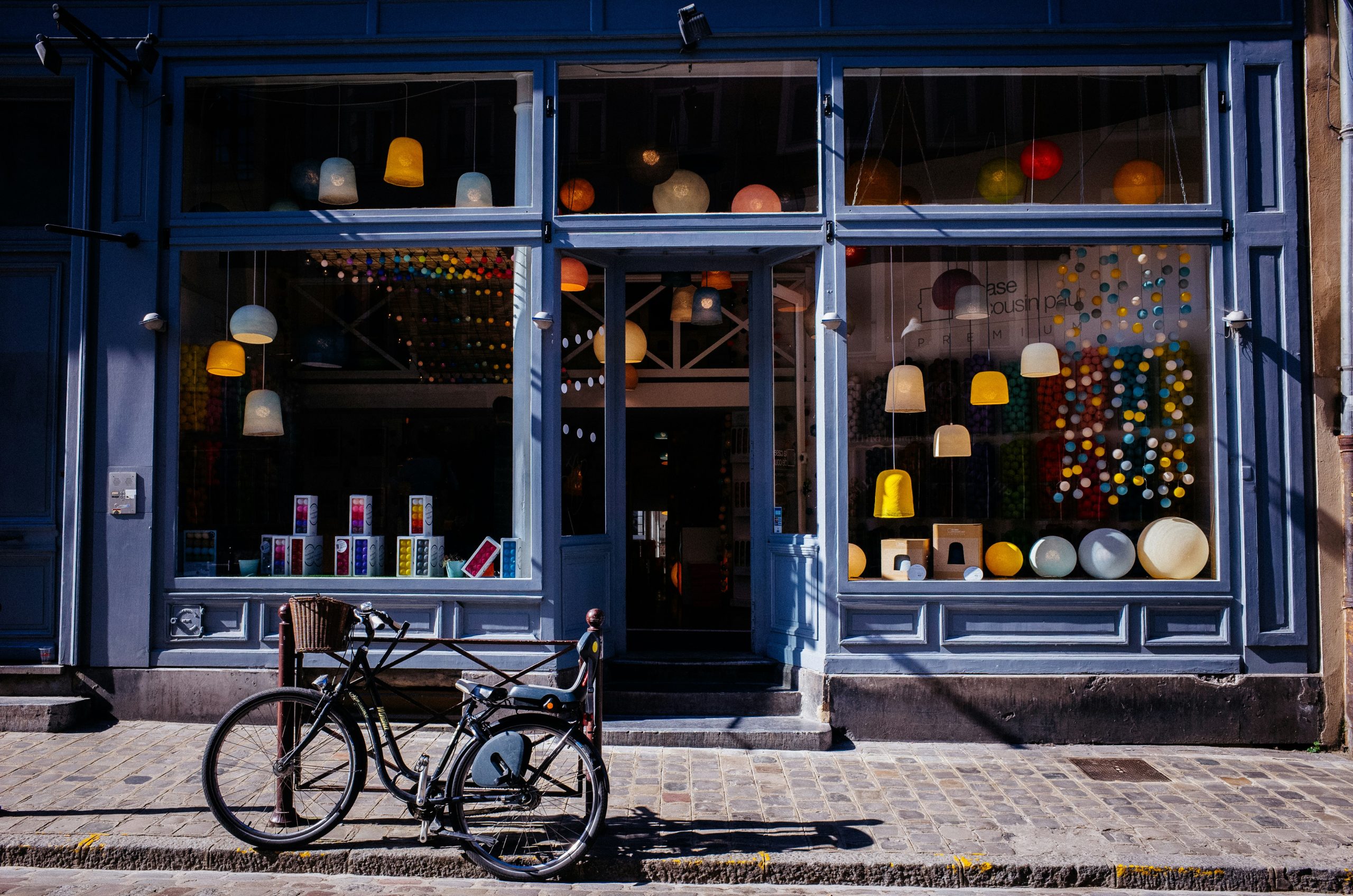 Historic pawn shop storefront with customer and staff interaction