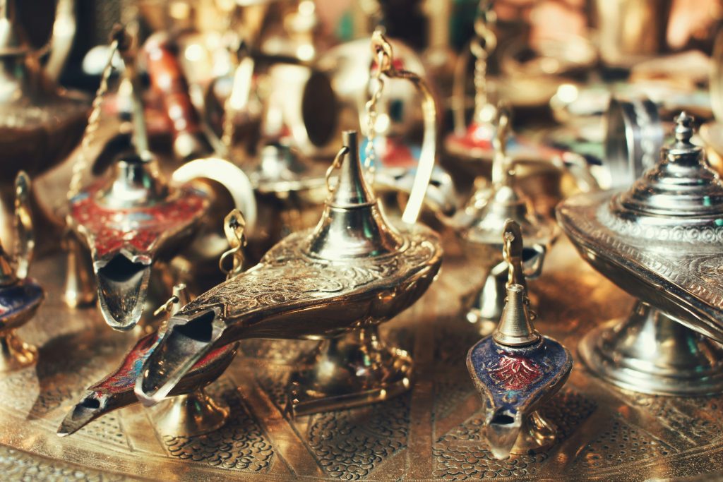 Assorted vintage oil lamps on display symbolizing the history and evolution of pawnshops