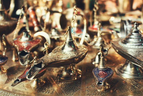 Assorted vintage oil lamps on display symbolizing the history and evolution of pawnshops