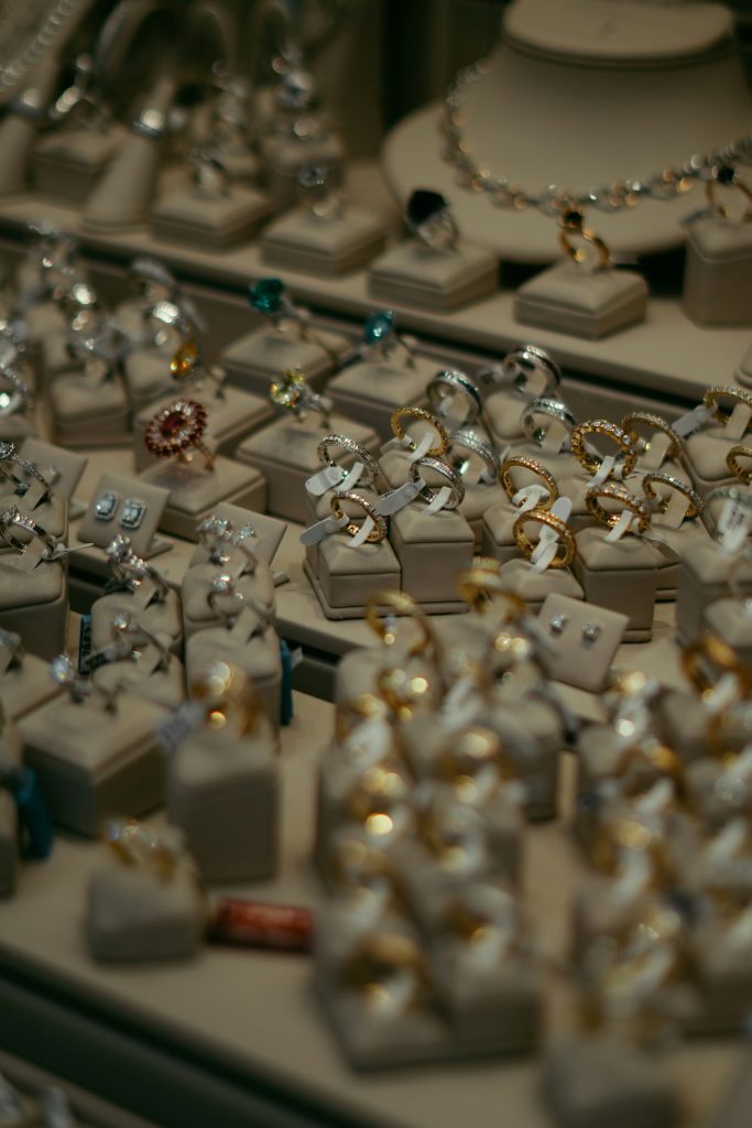 Display of gold and diamond rings in a pawn shop showcase