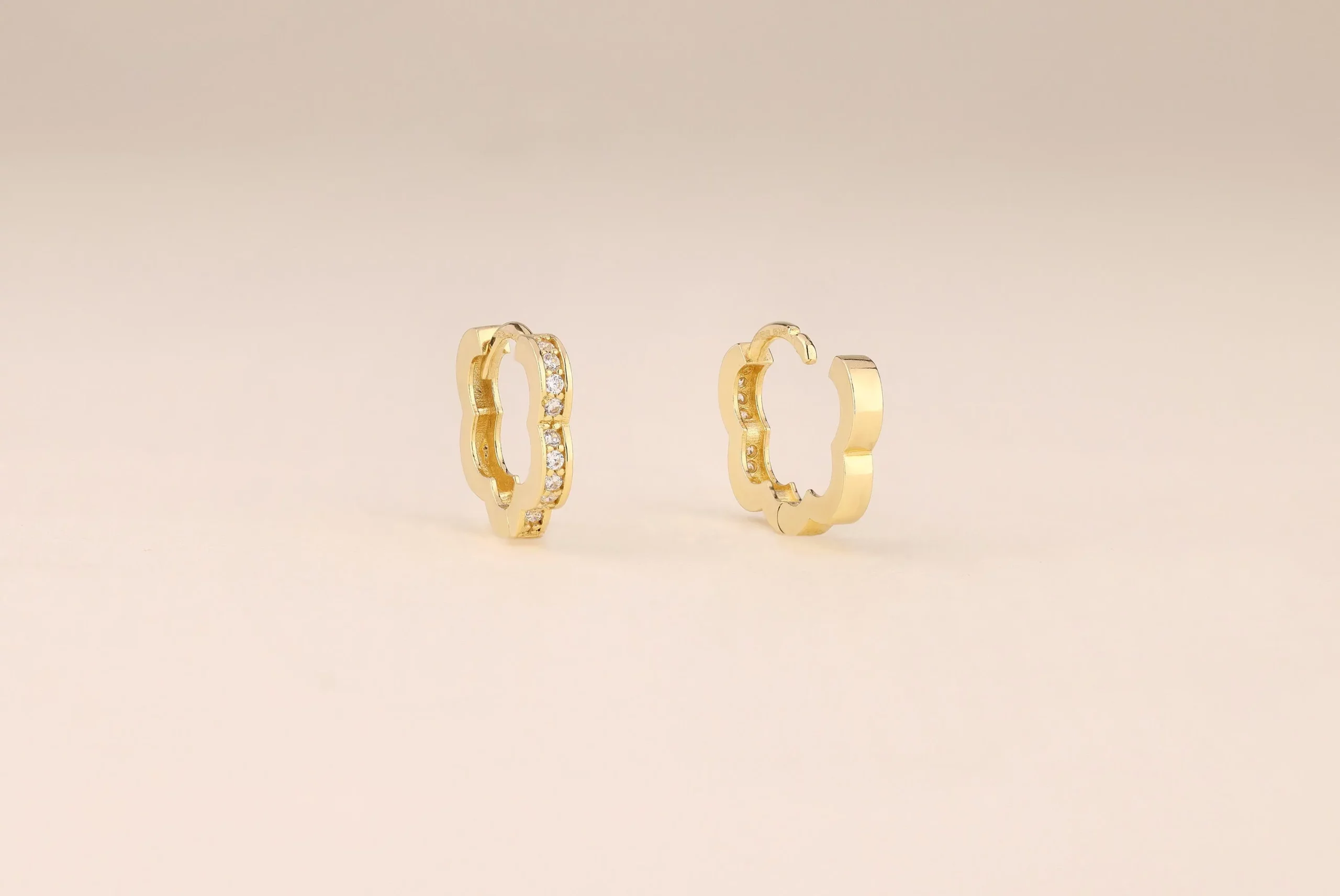 14 karat gold huggie earrings available at ideal jewelry and loan pawn shop Brockton
